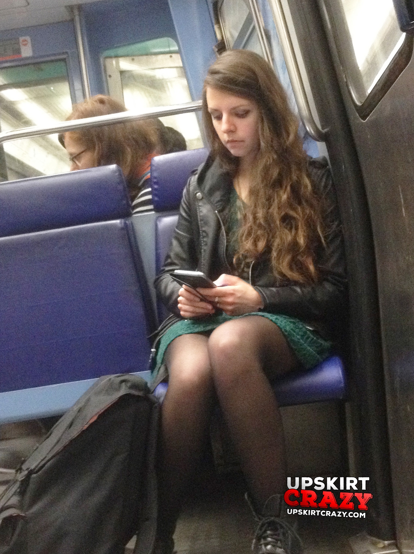 Cute girl texts in train