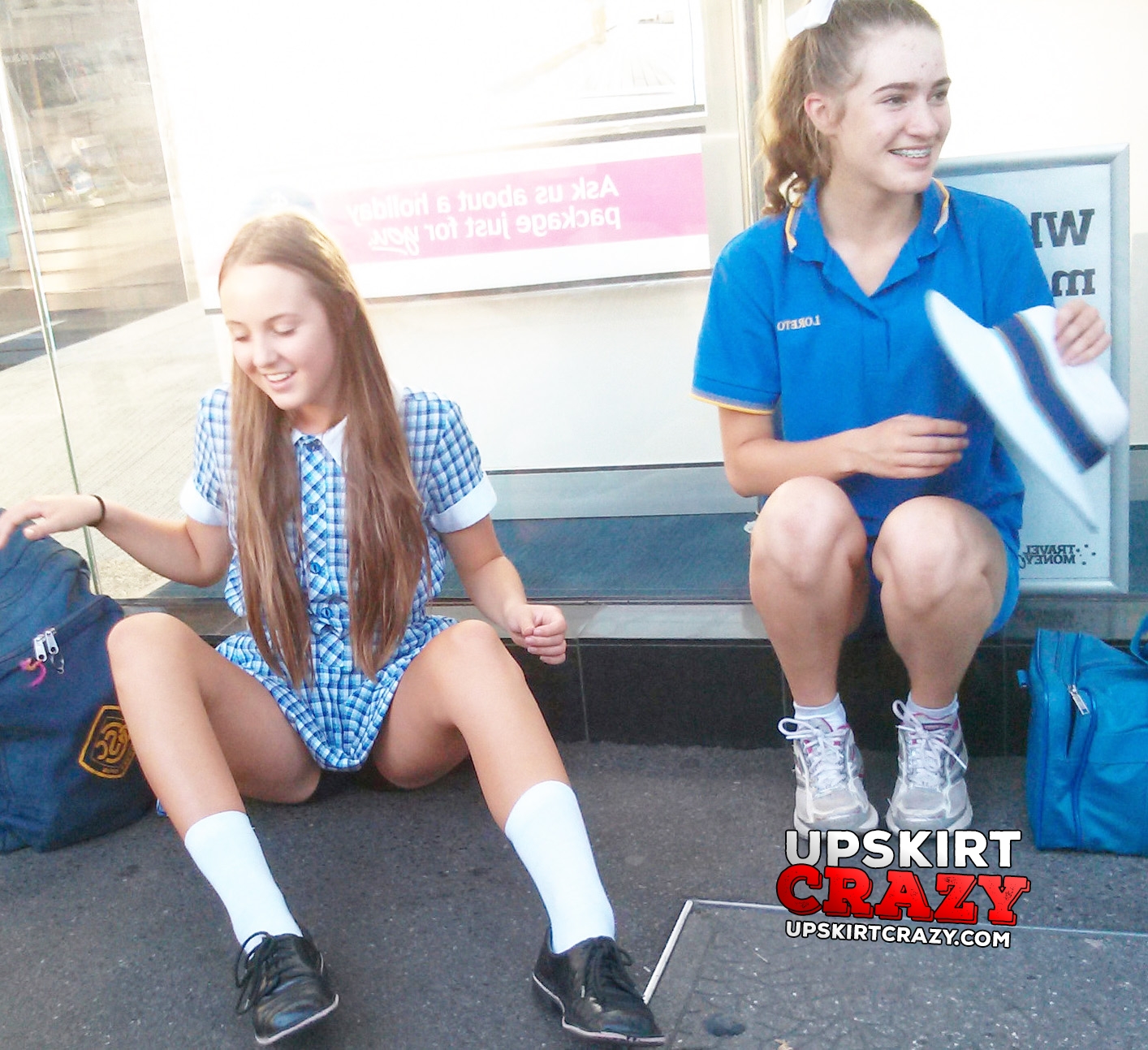 Upskirt of schoolgirl sitting on floor